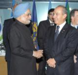PM with President of Mexico Mr. Felipe Calderon Hinojosa at the G20 Summit in Cannes (3 November 2011)